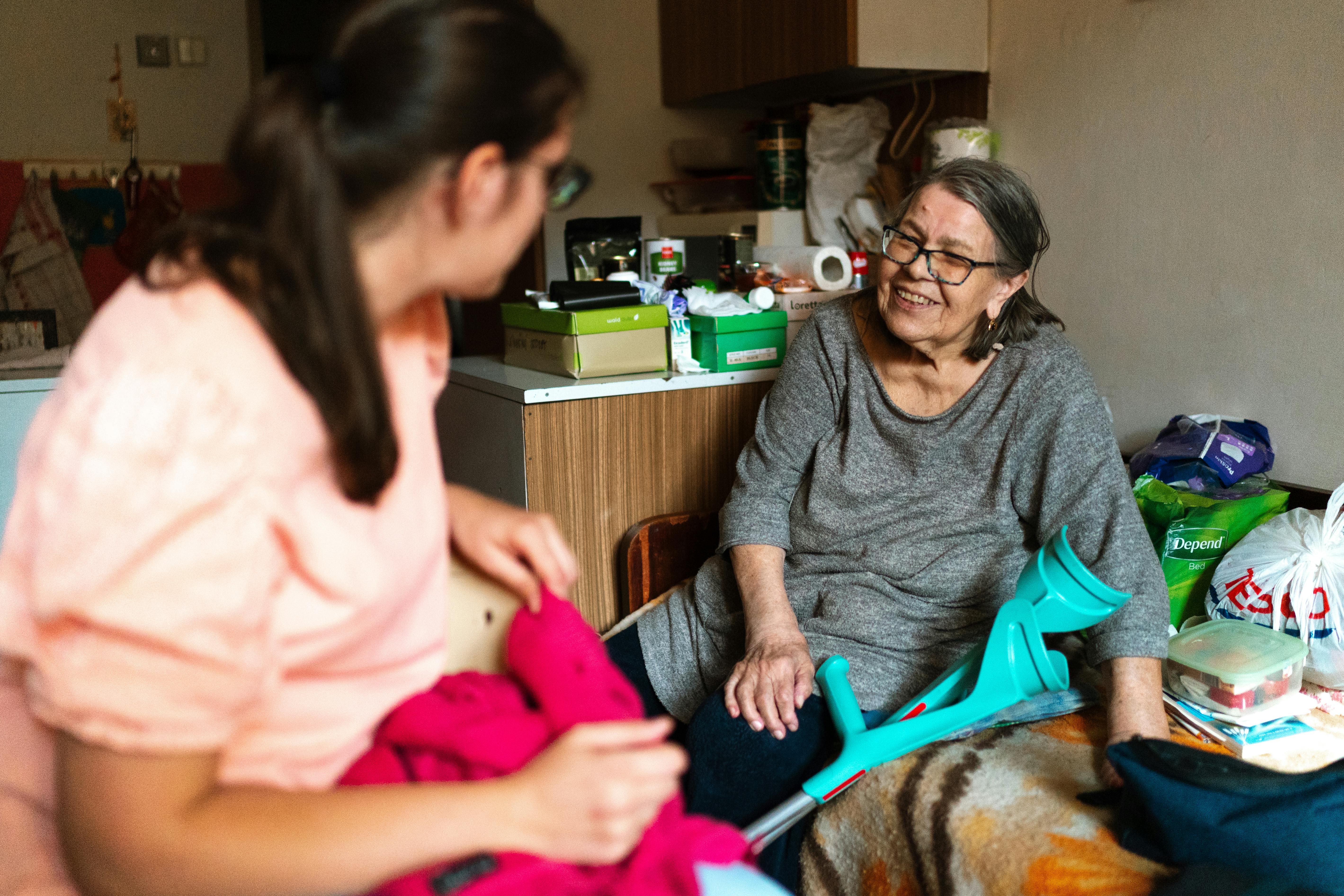 Caregiver supporting a senior during transition